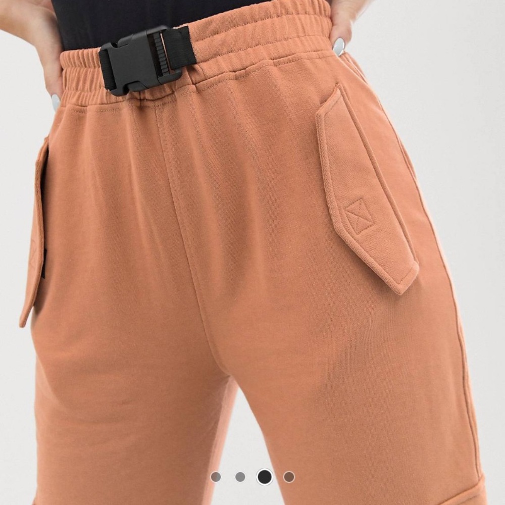 Orangy tan sweats with buckle.